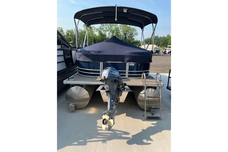 Slide: The Image of 2019 SunChaser Geneva Cruise 20 LR pontoon boat with canopy and outboard motor. - 2