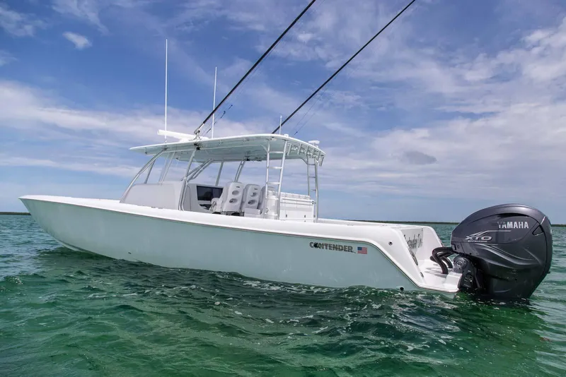 Slide: The Image of Manufacturer Provided Image: Contender 44 Fisharound 2026 on calm water, side view. - 4