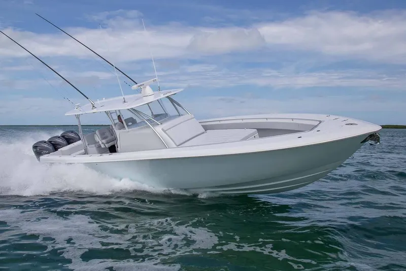 Slide: The Image of Manufacturer Provided Image: Contender 44 Fisharound 2026 cruising swiftly on open water. - 2