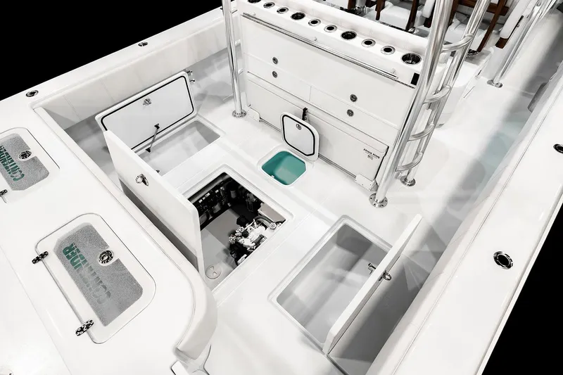 Slide: The Image of Manufacturer Provided Image: 2026 Contender 44 Fisharound boat interior with open storage compartments and sleek design. - 8