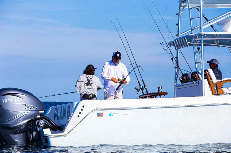 Slide: The Image of Manufacturer Provided Image: Anglers fishing on a 2026 Contender 44 ST boat. - 9