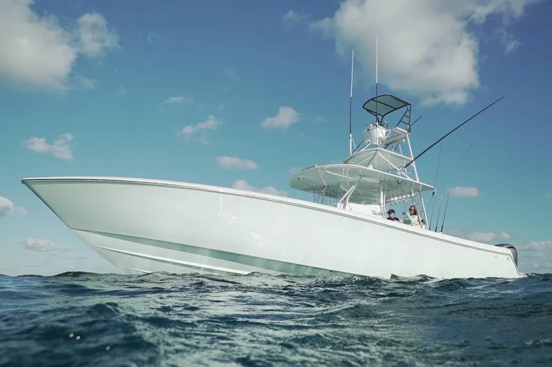 The Image of Manufacturer Provided Image: Contender 44 ST 2026 boat on open sea under blue sky. - 1