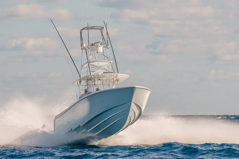 Slide: The Image of Manufacturer Provided Image: Contender 44 ST 2026 boat cruising at high speed on open sea. - 3