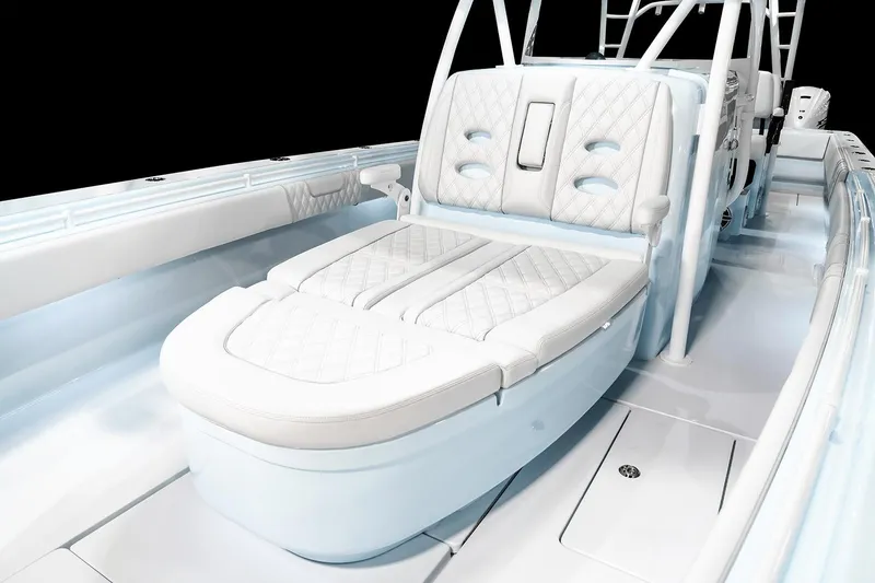 Slide: The Image of Manufacturer Provided Image: 2026 Contender 44 ST boat interior with luxurious white seating and modern design. - 12