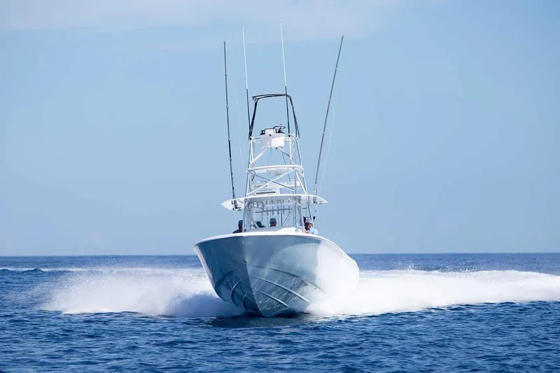 Slide: The Image of Manufacturer Provided Image: 2026 Contender 44 ST boat cruising on open sea - 4