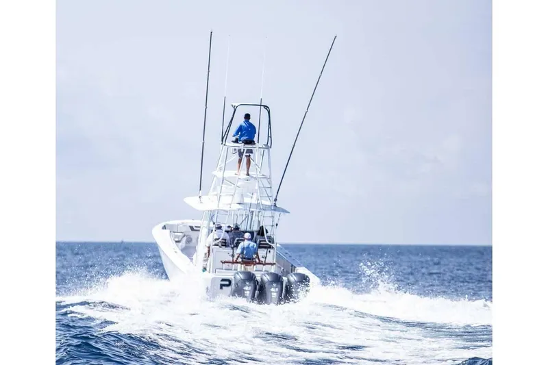 Slide: The Image of Manufacturer Provided Image: Contender 44 ST 2026 on open sea, rear view. - 7