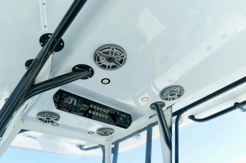 Slide: The Image of Interior view of 2024 Freeman 38 boat, featuring speakers and control panel. - 17