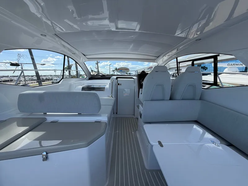 Slide: The Image of Interior of a modern yacht with gray seating and sleek design. - 23