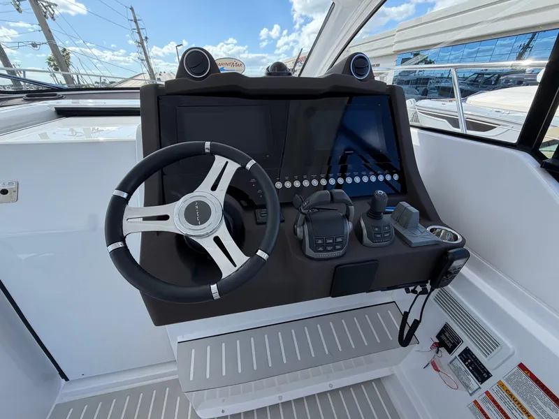 Slide: The Image of The image shows the helm of a 2027 Azimut A45 with modern instruments. - 40