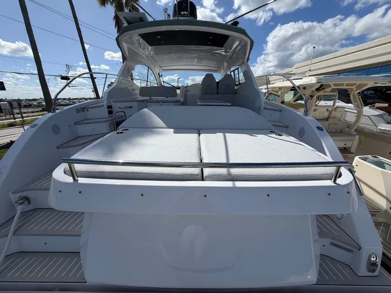 Slide: The Image of The image shows the stern of a 2027 Azimut A45 yacht with a spacious sun deck. - 13