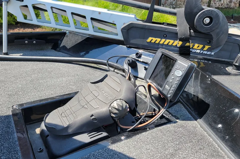 Slide: The Image of 2015 Crestliner VT 18 boat with Minn Kota trolling motor and fish finder. - 5