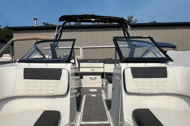 Slide: The Image of 2022 Bayliner VR5 Bowrider I/O interior with sleek seating and modern design. - 12