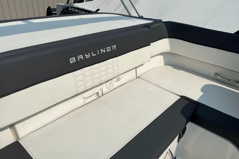 Slide: The Image of 2022 Bayliner VR5 Bowrider I/O interior seating with sleek design and comfortable upholstery. - 5