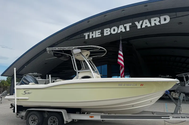 Slide: The Image of 2006 Scout 222 Sportfish boat on trailer at The Boat Yard, featuring Yamaha engine. - 5