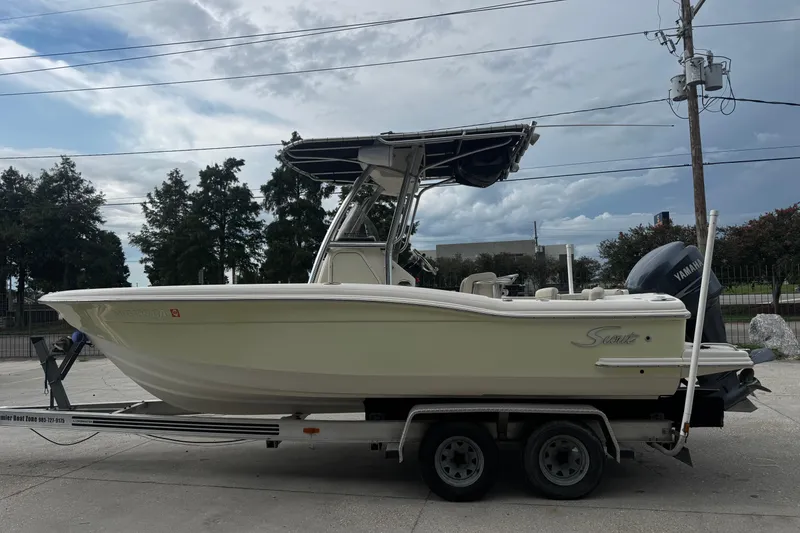 Slide: The Image of 2006 Scout 222 Sportfish boat on trailer, side view, with Yamaha outboard motor. - 7