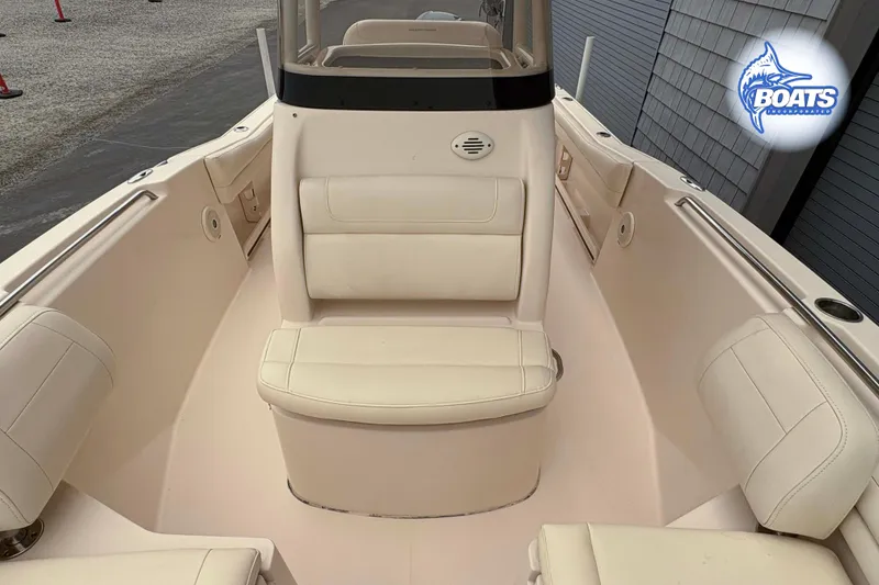 Slide: The Image of 2018 Grady-White Fisherman 216 boat interior with cushioned seating and sleek design. - 5