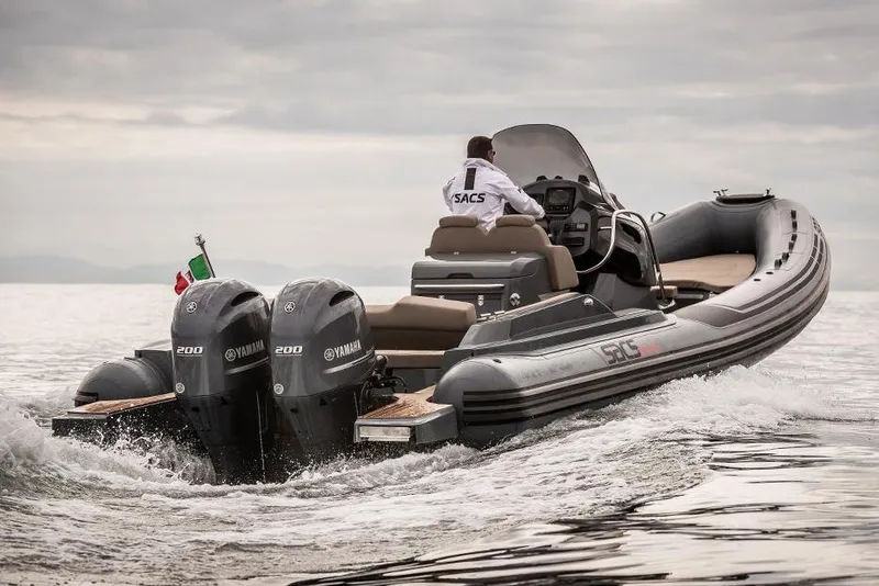 Slide: The Image of Manufacturer Provided Image: 2022 SACS Strider 900 boat with dual Yamaha engines on water. - 28