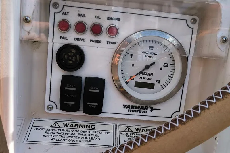 Slide: The Image of Control panel of a 2011 Beneteau Oceanis 40 sailboat with Yanmar marine RPM gauge. - 34