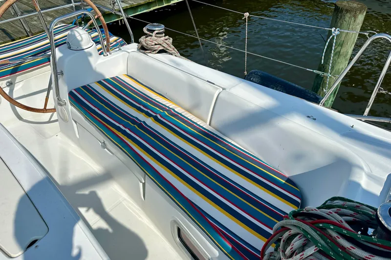 Slide: The Image of Colorful striped seating on 2010 Beneteau Oceanis 40 sailboat deck. - 20