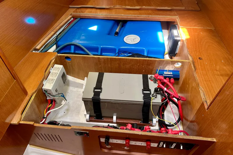 Slide: The Image of Electrical and water system compartment in a 2010 Beneteau Oceanis 40 sailboat. - 53