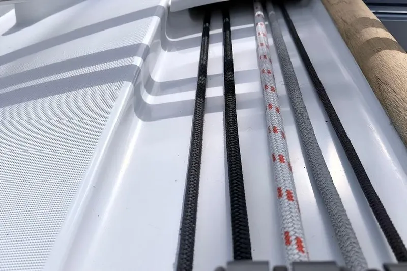 Slide: The Image of Close-up of ropes on a 2011 Beneteau Oceanis 40 sailboat deck. - 30