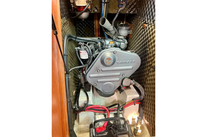Slide: The Image of Engine compartment of a 2010 Beneteau Oceanis 40 sailboat with Yanmar engine. - 52
