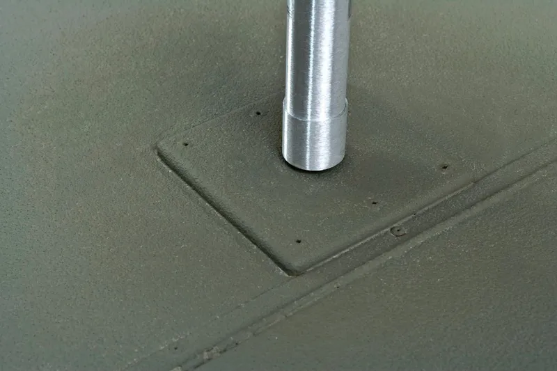 Slide: The Image of Close-up of a metal post on a textured surface, likely part of a boat deck. - 21