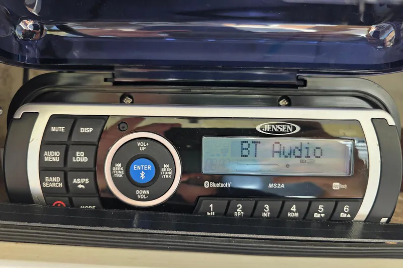 Slide: The Image of Jensen MS2A Bluetooth audio system on 2002 Regulator 26 Center Console boat. - 18