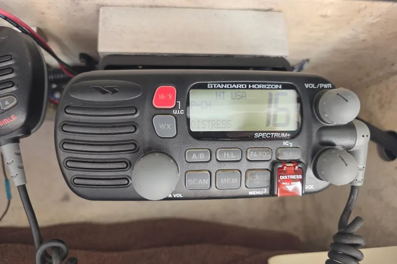 Slide: The Image of Standard Horizon marine radio on a 2002 Regulator 26 Center Console boat. - 19