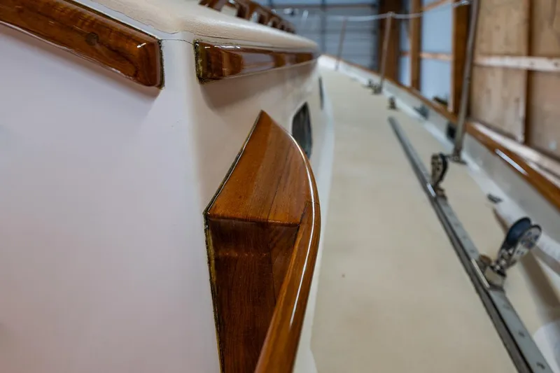 Slide: The Image of 1981 Morris Yachts Leigh 30 sailboat with polished wooden trim detail. - 3