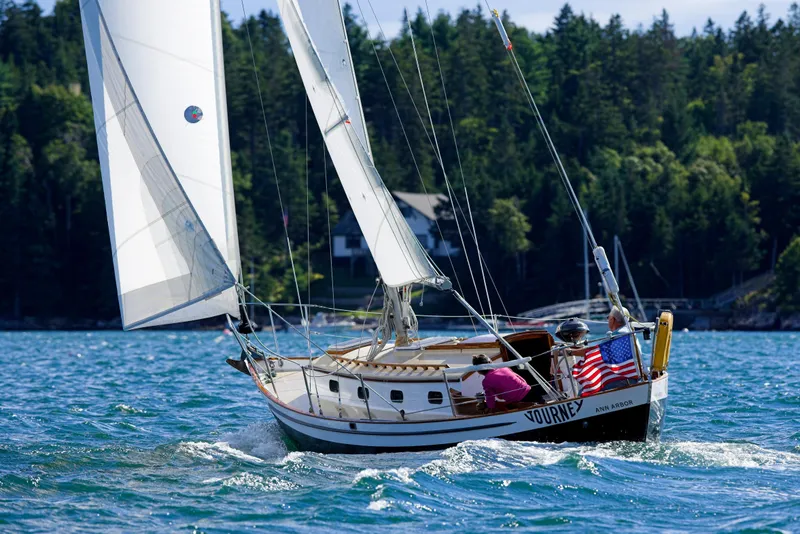 The Image of Sailing yacht Morris Yachts Leigh 30, 1981, cruising on a scenic lake with forested backdrop. - 1