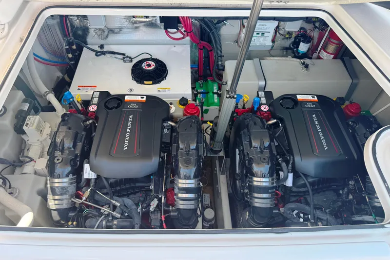 Slide: The Image of Engine compartment of a 2017 Regal 30 Express boat with dual Volvo Penta engines. - 26