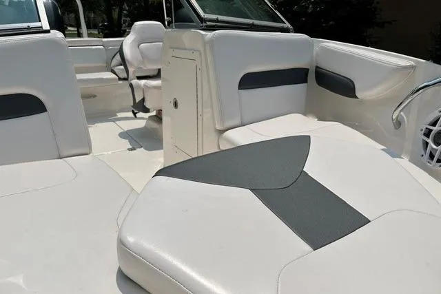 Slide: The Image of 2021 Chaparral 19 SSi OB boat interior with white and gray seating. - 4