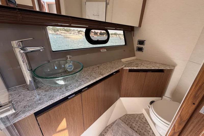 Slide: The Image of Luxurious bathroom interior of 2017 Sea Ray Sundancer 460 yacht with modern fixtures. - 43