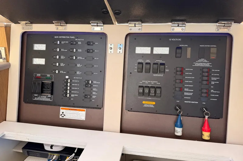 Slide: The Image of Electrical control panel on a 2017 Sea Ray Sundancer 460 yacht. - 19