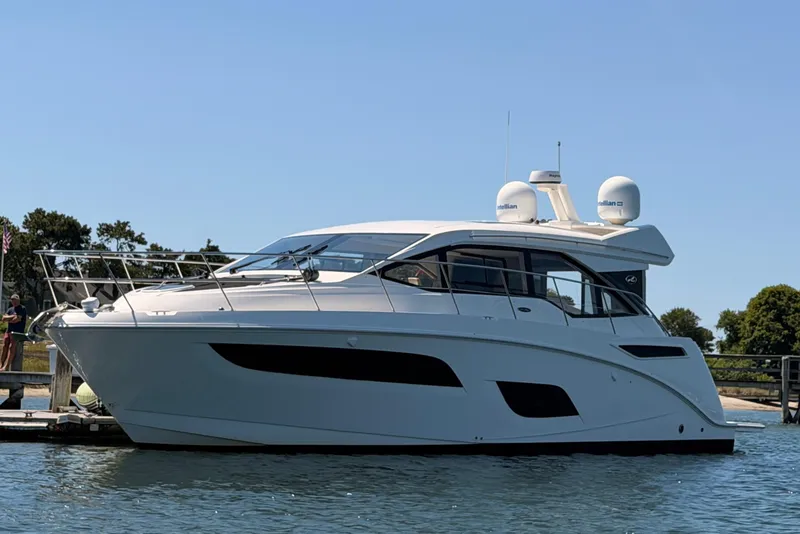 The Image of 2017 Sea Ray Sundancer 460 yacht docked on a sunny day. - 0