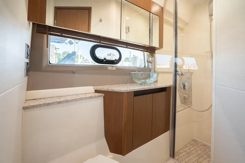 Slide: The Image of Luxurious bathroom in 2017 Sea Ray Sundancer 460 yacht with modern fixtures. - 54