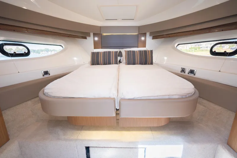 Slide: The Image of Luxurious cabin interior of 2017 Sea Ray Sundancer 460 yacht with comfortable bedding. - 48