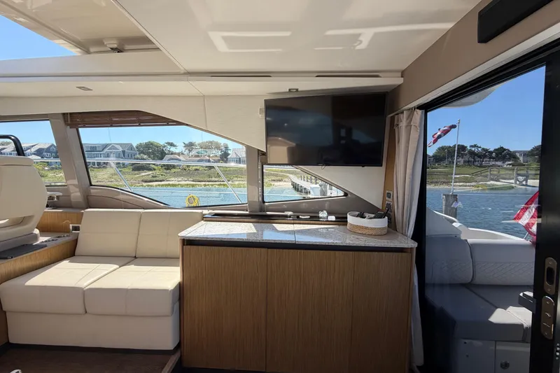 Slide: The Image of Luxurious interior of 2017 Sea Ray Sundancer 460 yacht with scenic waterfront view. - 18