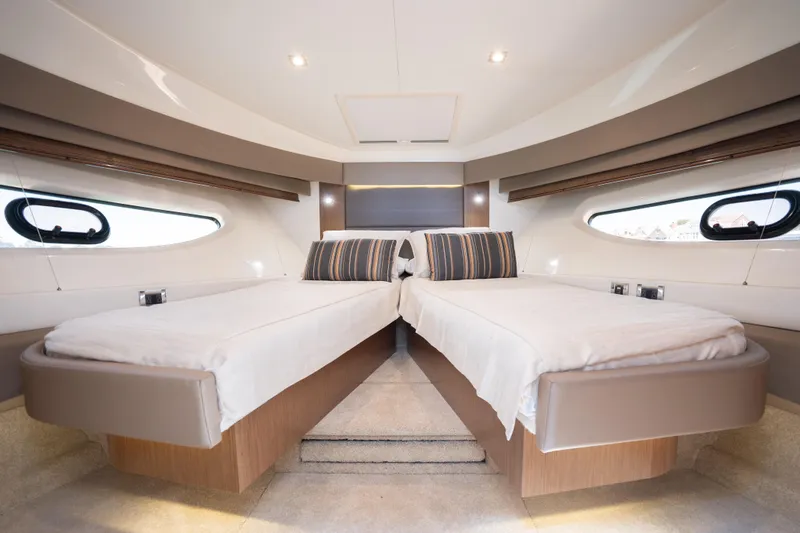 Slide: The Image of Luxurious interior of 2017 Sea Ray Sundancer 460 yacht with twin beds and modern design. - 49