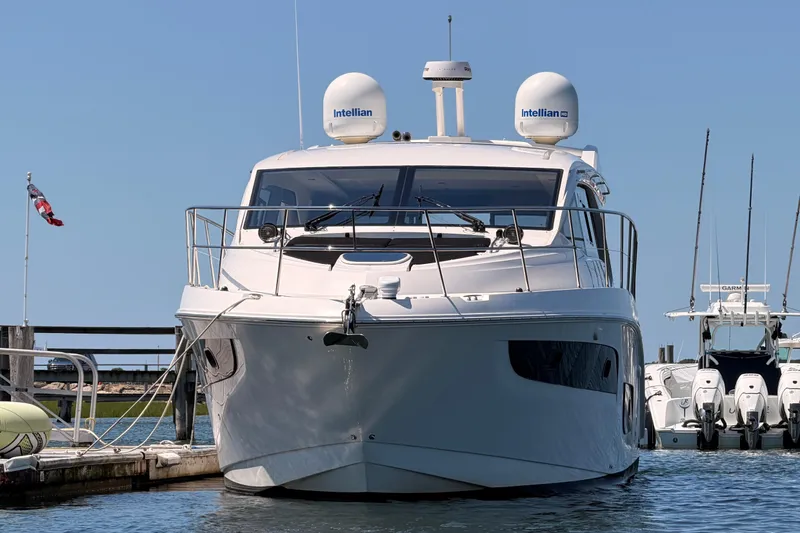 Slide: The Image of 2017 Sea Ray Sundancer 460 yacht docked at marina, front view. - 3