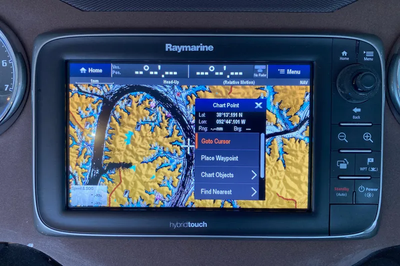 Slide: The Image of Raymarine GPS navigation screen on 2015 Cobalt 336 boat, displaying chart point coordinates. - 28