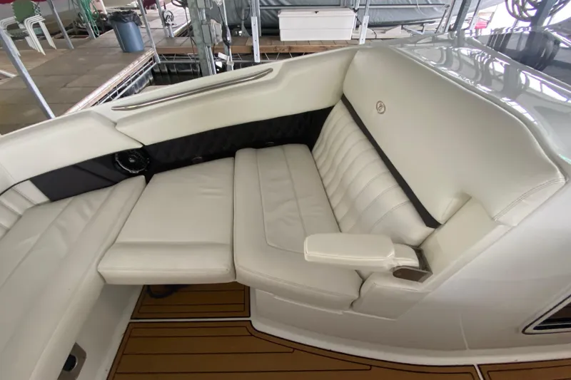 Slide: The Image of Luxurious white seating on a 2015 Cobalt 336 boat, featuring elegant design and comfort. - 38