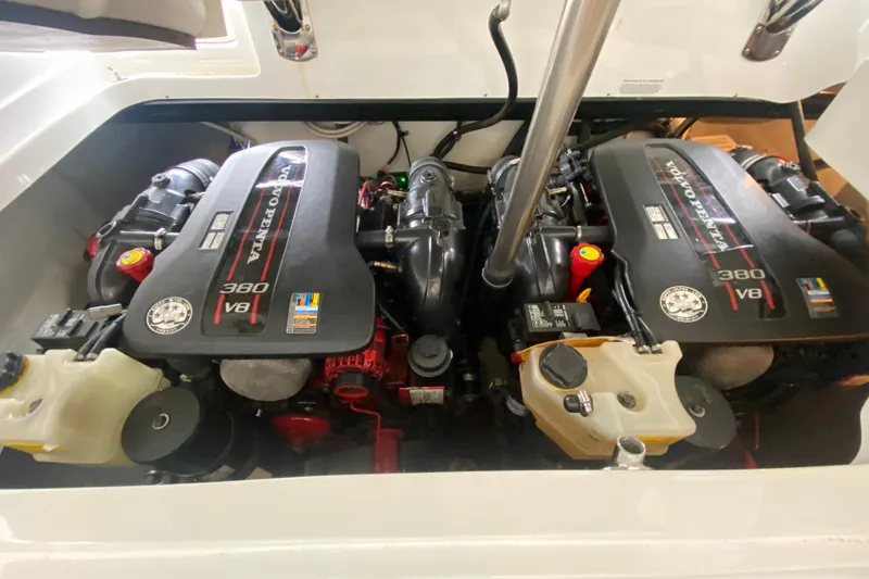 Slide: The Image of Twin Volvo Penta 380 V8 engines in a 2015 Cobalt 336 boat engine compartment. - 48