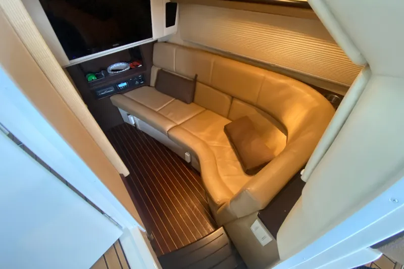 Slide: The Image of 2015 Cobalt 336 cabin interior with leather seating and entertainment system. - 40