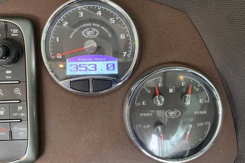 Slide: The Image of Dashboard of a 2015 Cobalt 336 showing RPM and fuel gauges. - 31