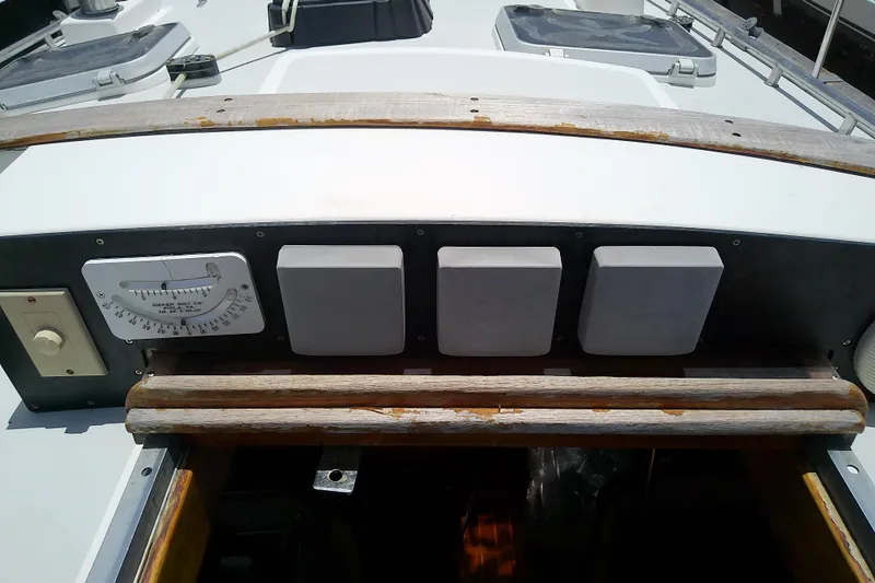 Slide: The Image of Control panel of a 1988 Brewer 44 sailboat with gauges and switches. - 38