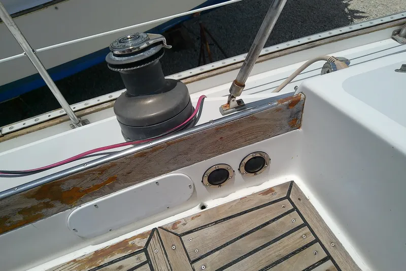 Slide: The Image of Cockpit of 1988 Brewer 44 sailboat with winch and weathered wood details. - 29