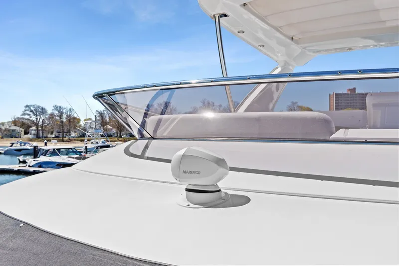 Slide: The Image of The image shows the deck of a 2022 Azimut 50 with a radar and clear skies. - 18