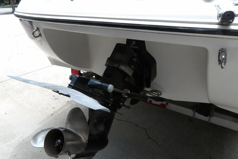 Slide: The Image of 2012 Stingray 195 LS/LX boat with MerCruiser outdrive, rear view. - 10
